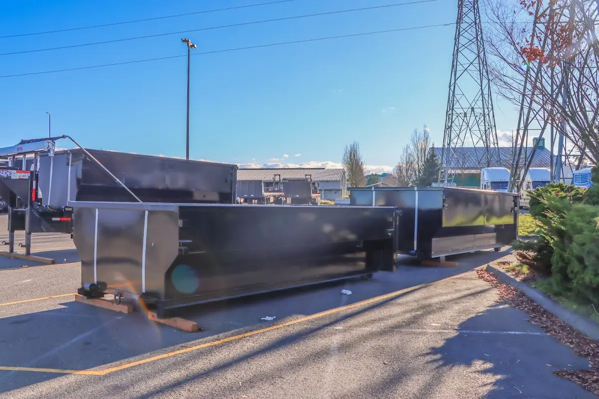 Roll-off dumpster ready for waste disposal at job site for Yard Waste Dumpster Rental in Herculaneum